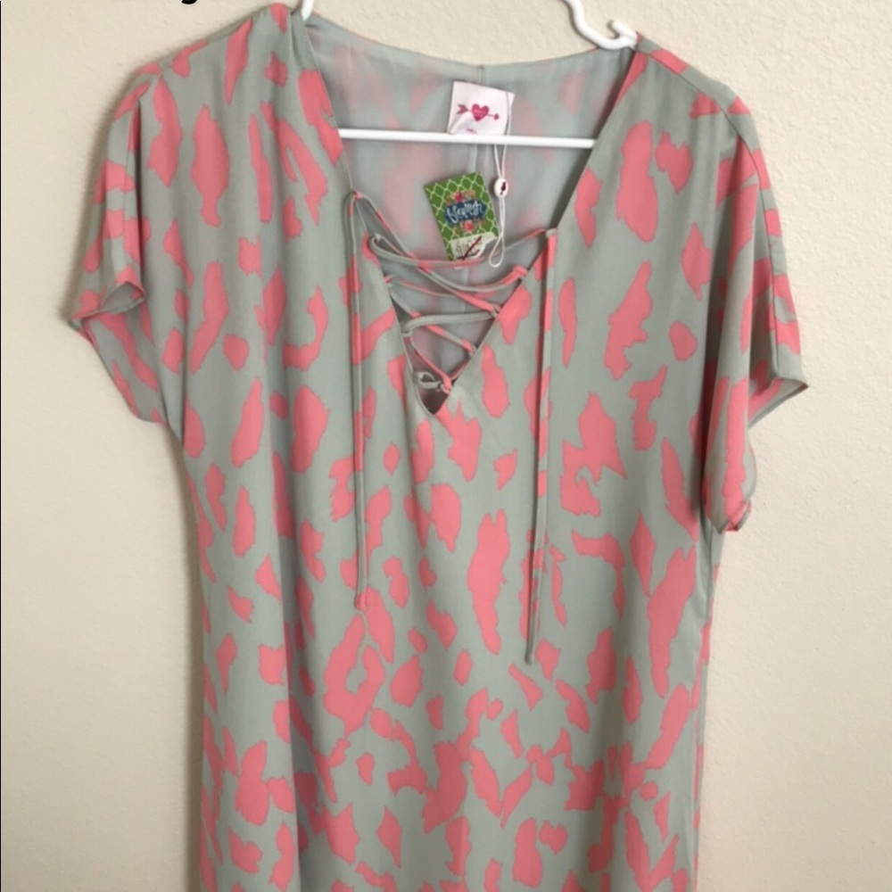 Fun animal print blouse with neck detail